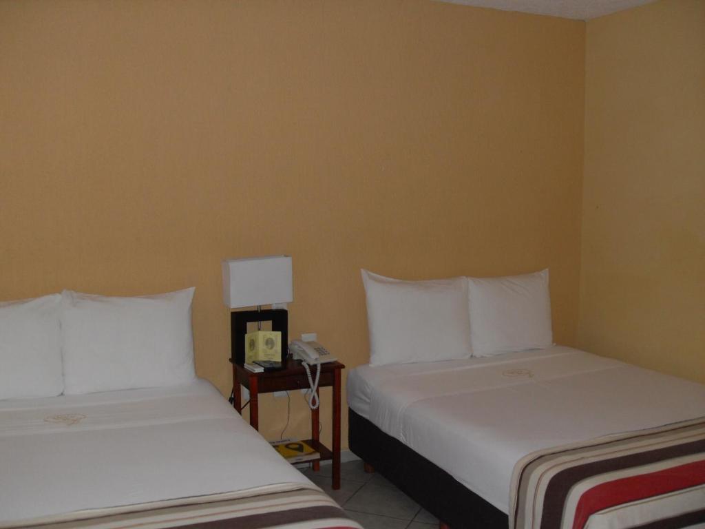 Madero Suites Coatzacoalcos Pokoj fotografie